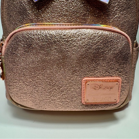 NWT. Loungefly Disney Minnie Mouse backpack. Metallic pink iridescent color - Picture 4 of 16